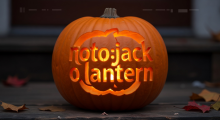 Glowing carved pumpkin logo